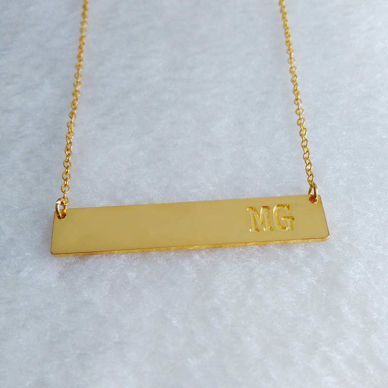 What Does The Gold Bar Necklace Mean at Quincy Gean blog
